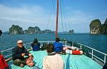 enjoying the secenery on a Halong Bay boat trip