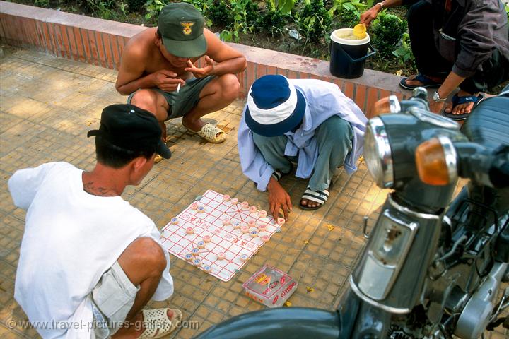 men playing a board game