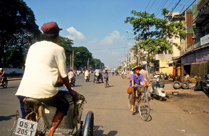 travelling around in a cyclo, a cycle rickshaw
