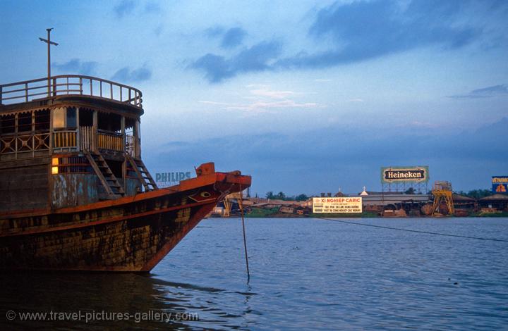 a boat on the Saigon River at sunset