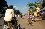 travelling around in a cyclo, a cycle rickshaw