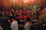 boys worshipping at a temple