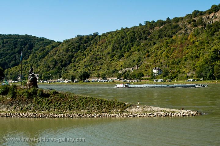 at the Loreley (Lorelei), luring the ships