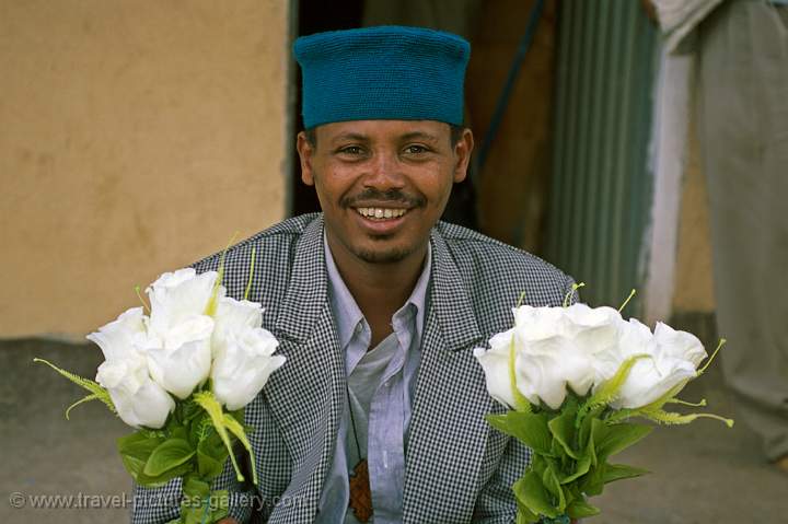 priest with flowers, Gonder