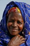 local woman with a colourful headscarf