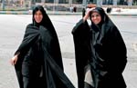 Iranian people, laughing women in front of holy shrine of Imam Khomeini