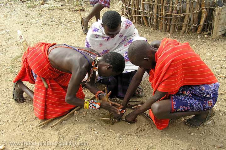 Masai men making a fire, Samburu N.P.