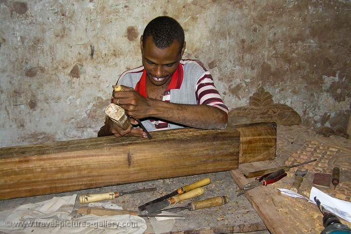 sculptor at work, Lamu