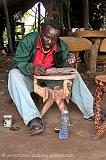 man decorating tables, Diani Beach, Mombasa