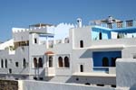 whitewashed houses in a  coastal village