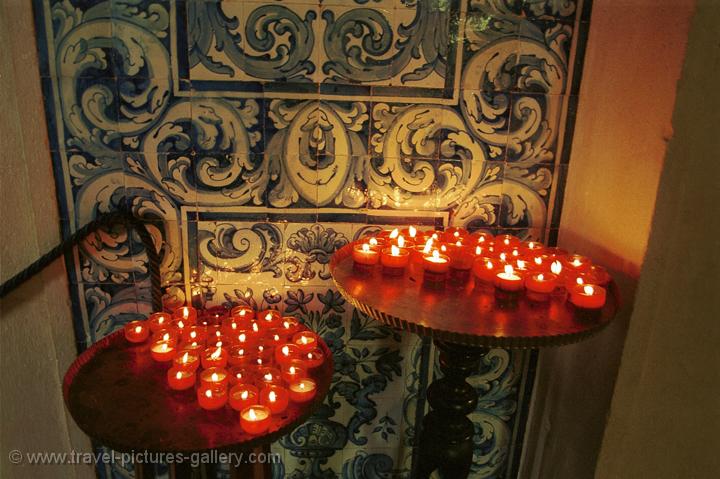 candles and Azulejos (tiles) in the Ingreja de Santa Maria church, Obidos