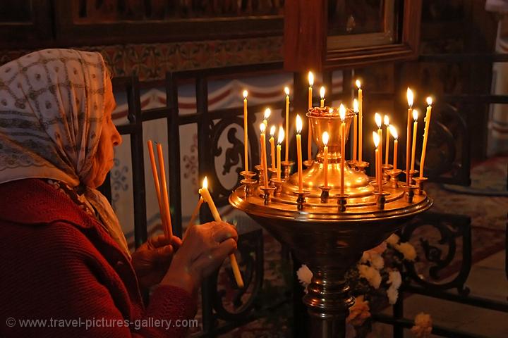 burning a candle at the Cathedral of St. Sophia, Novgorod Kremlin
