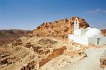 white mosque in front of the old Chenine Ksour hill villages