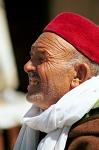 local market seller, traditional hat