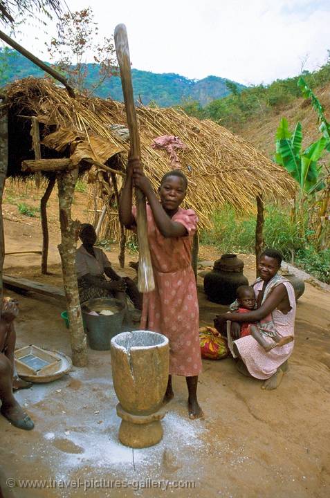 pounding the corn, Zambia