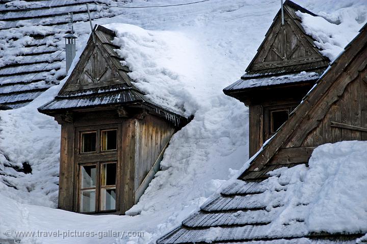 wooden house, lot's of snow