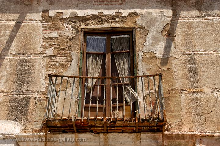 dilapidated balcony, old town