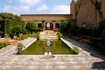 the garden and pool at the Alcazaba
