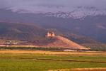 medieval castle at the foot of the mountains