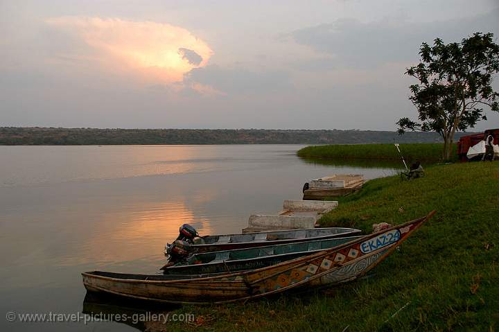 fishing boats at sunset